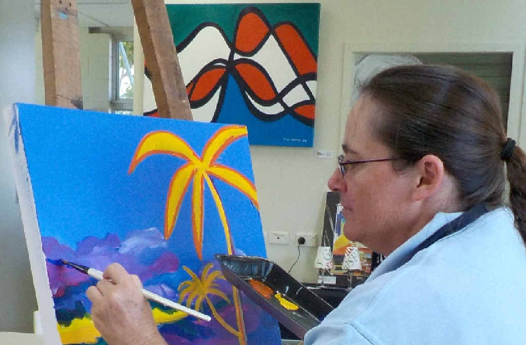 QUALITY TIME: Volunteers help others while also working on their own projects. QUALITY TIME: Volunteers help others while also working on their own projects.